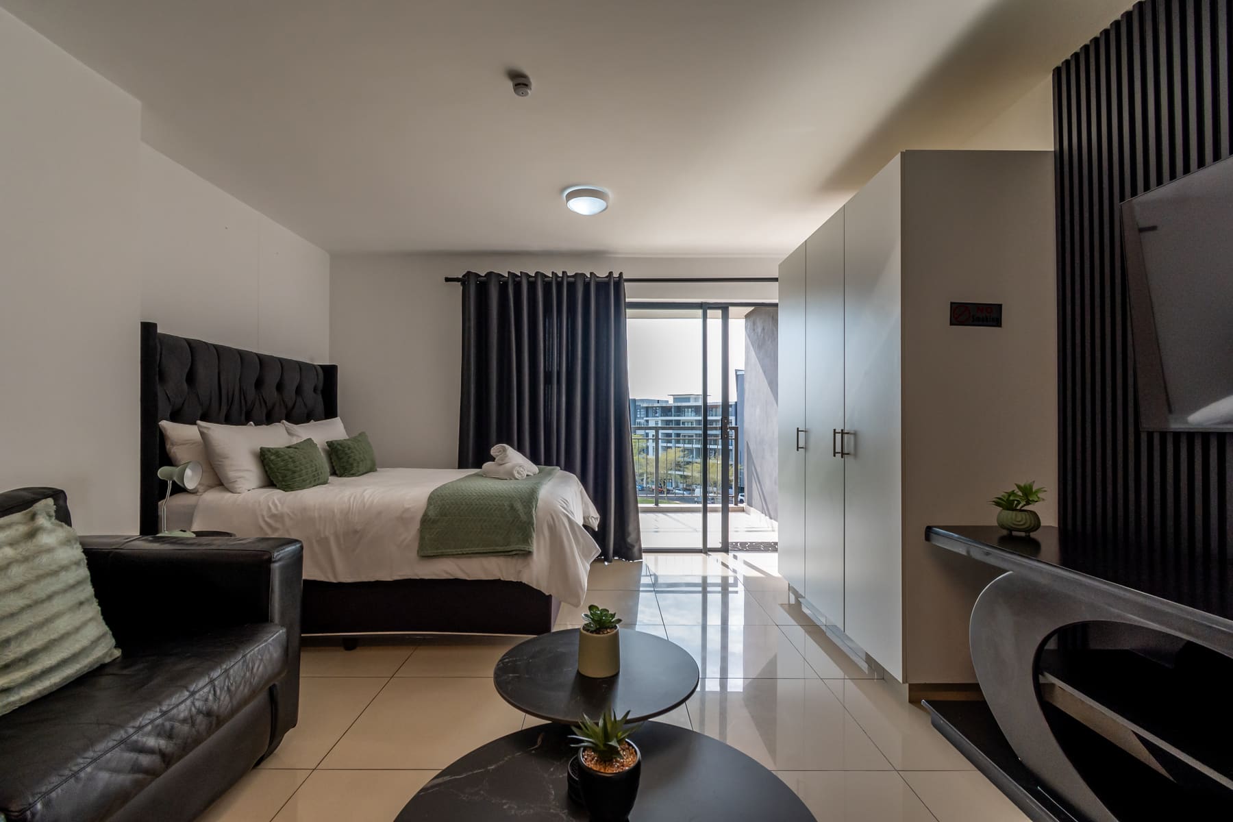 Open-plan lounge and kitchen in Studio Sage