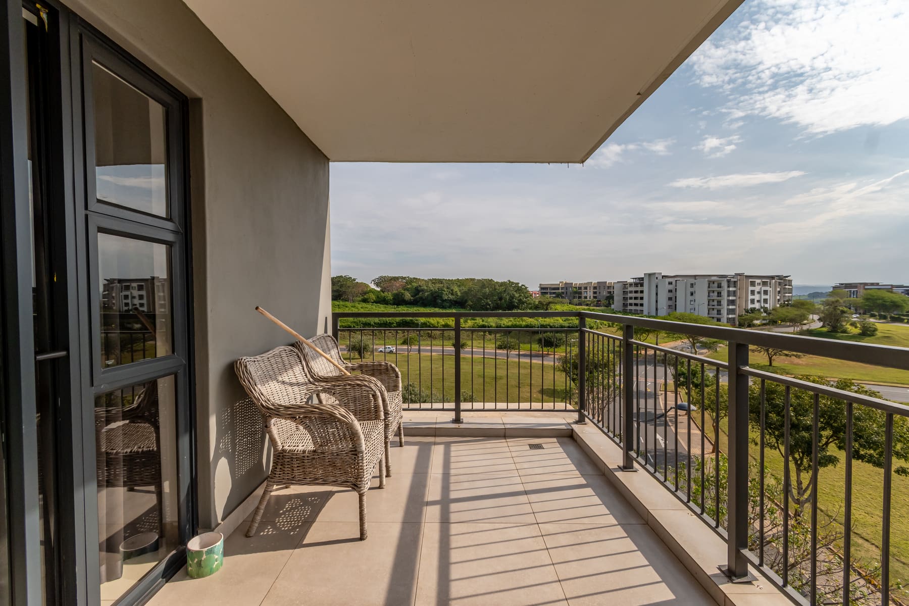 Full-size balcony overlooking the gardens
